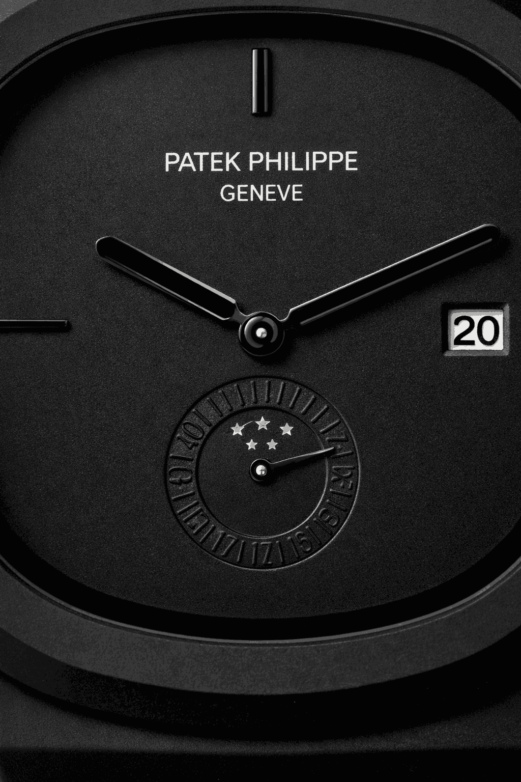 Macro close up of matte black watch dial